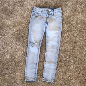 Three button ripped jeans from hippie girl.